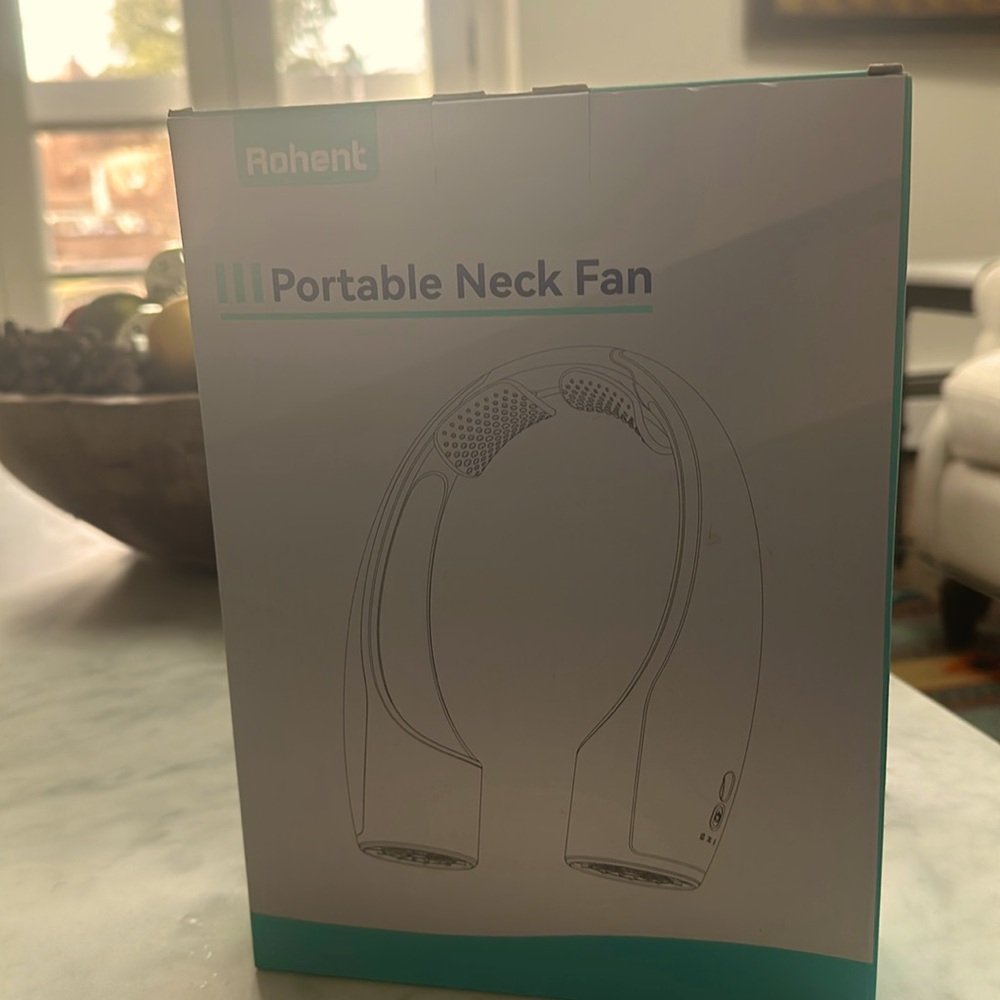 Rohent portable neck fan. Never opened, never used
